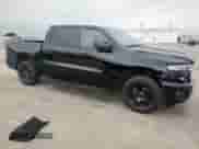 2025 Ram 1500 Tradesman with VIN 1C6RREGG8SN642122, listed as a Copart auction lot 54216325 with 2,668 mi miles and Salvage title. Bid and sale history available at DreamBid. Image 4.