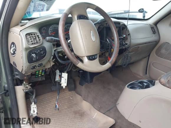 2002 Ford F-150 XLT с VIN 1FTRW08L42KE05595, выставлен на аукционе IAAI как лот 42108052 с пробегом Не указан миль и . История ставок и продаж доступна на DreamBid. Изображение 12.