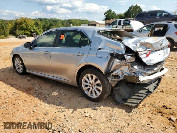 2019 Toyota Camry LE с VIN 4T1B11HK1KU820984, выставлен на аукционе Copart как лот 71323335 с пробегом 93 055 миль миль и Списание • Salvage title. История ставок и продаж доступна на DreamBid. Изображение 2.