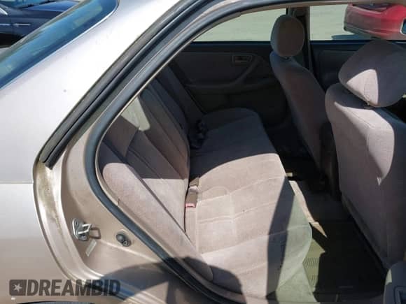 1997 Toyota Camry LE z VIN 4T1BF22K0VU029186, wystawiony jako IAAI lot #42029297 z przebiegiem 153 204 mil mil oraz . Historia ofert i sprzedaży dostępna na DreamBid. Obrazek 8.