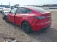 2022 Tesla Model Y Long Range z VIN 7SAYGAEE3NF484623, wystawiony jako IAAI lot #42982060 z przebiegiem 29 313 mil mil oraz . Historia ofert i sprzedaży dostępna na DreamBid. Obrazek 3.