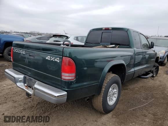1998 Dodge Dakota SLT z VIN 1B7GG22Y0WS663798, wystawiony jako Copart lot #44569915 z przebiegiem Nie podano mil oraz Szkoda całkowita • Salvage title. Historia ofert i sprzedaży dostępna na DreamBid. Obrazek 3.