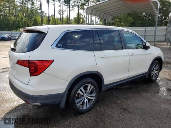 2017 Honda Pilot EX-L with VIN 5FNYF5H69HB042767, listed as a Copart auction lot 71764514 with 194,819 mi miles and Salvage title. Bid and sale history available at DreamBid. Image 3.