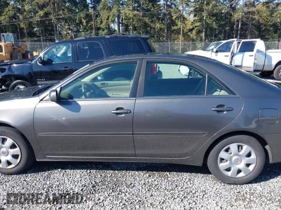 2003 Toyota Camry LE with VIN JTDBE32K530180767, listed as a IAAI auction lot 43276458 with 189,568 mi miles and . Bid and sale history available at DreamBid. Image 14.