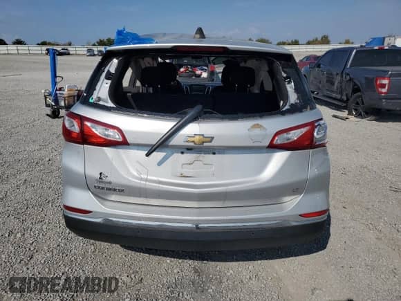 2018 Chevrolet Equinox LT z VIN 2GNAXJEV9J6283752, wystawiony jako Copart lot #71990665 z przebiegiem Nie podano mil oraz Szkoda całkowita • Salvage title. Historia ofert i sprzedaży dostępna na DreamBid. Obrazek 6.