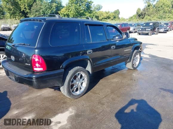 1999 Dodge Durango with VIN 1B4HS28Y8XF571839, listed as a IAAI auction lot 43147607 with 88,600 mi miles and . Bid and sale history available at DreamBid. Image 4.