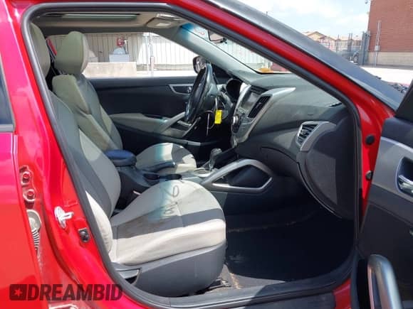 2014 Hyundai Veloster с VIN KMHTC6AD7EU189136, выставлен на аукционе IAAI как лот 42567617 с пробегом 137 688 миль миль и . История ставок и продаж доступна на DreamBid. Изображение 5.