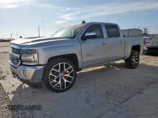 2018 Chevrolet Silverado 1500 LTZ z VIN 3GCPCSEC5JG315054, wystawiony jako Copart lot #62349505 z przebiegiem 86 455 mil mil oraz Szkoda całkowita • Salvage title. Historia ofert i sprzedaży dostępna na DreamBid. Obrazek 1.