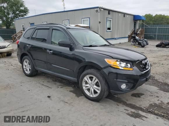 2011 Hyundai Santa Fe Limited с VIN 5XYZKDAG4BG072482, выставлен на аукционе Copart как лот 82022415 с пробегом 128 203 миль миль и Списание • Salvage title. История ставок и продаж доступна на DreamBid. Изображение 4.
