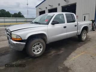 2004 Dodge Dakota SLT z VIN 1D7HG48N64S751657, wystawiony jako Copart lot #70761615 z przebiegiem 161 923 mil mil oraz Szkoda całkowita • Salvage title. Historia ofert i sprzedaży dostępna na DreamBid. Obrazek 1.