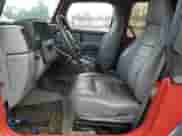 1998 Jeep Wrangler SE with VIN 1J4FY29P8WP767006, listed as a Copart auction lot 55603315 with 146,169 mi miles and Salvage title. Bid and sale history available at DreamBid. Image 7.