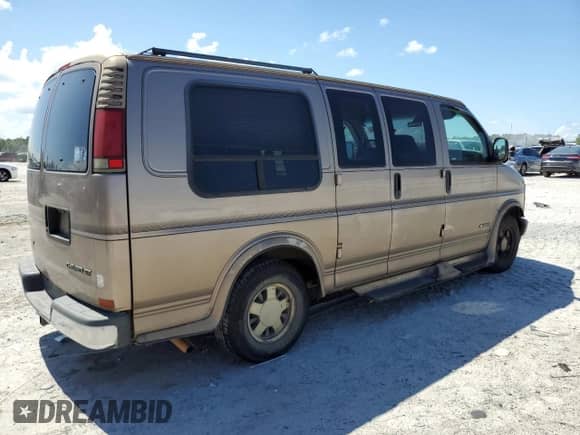 1999 Chevrolet Express с VIN 1GBFG15R2X1008869, выставлен на аукционе Copart как лот 61620025 с пробегом Не указан миль и Списание • Salvage title. История ставок и продаж доступна на DreamBid. Изображение 3.