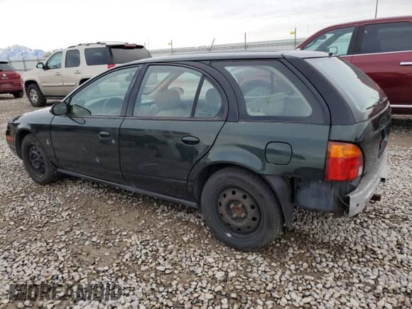 2000 Saturn SW with VIN 1G8ZN8279YZ197642, listed as a Copart auction lot 81362264 with 223,302 mi miles and Salvage title. Bid and sale history available at DreamBid. Image 2.