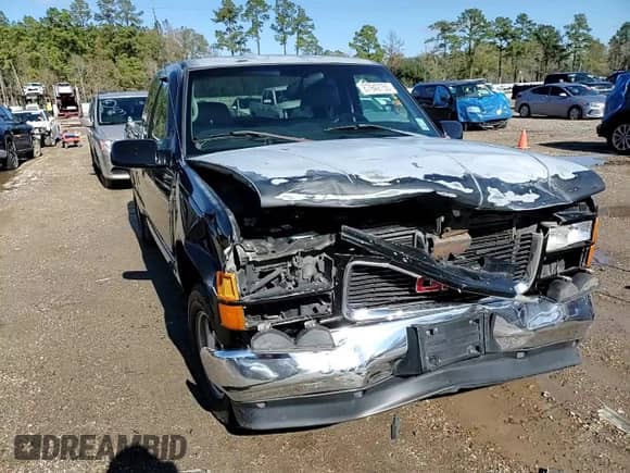1998 GMC Sierra 1500 z VIN 1GTEC19M2WE513447, wystawiony jako Copart lot #87942755 z przebiegiem 209 492 mil mil oraz Szkoda całkowita • Salvage title. Historia ofert i sprzedaży dostępna na DreamBid. Obrazek 11.