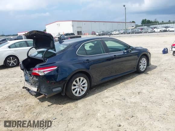 2019 Toyota Camry LE с VIN 4T1B11HK0KU808129, выставлен на аукционе IAAI как лот 43037543 с пробегом 143 999 миль миль и . История ставок и продаж доступна на DreamBid. Изображение 4.
