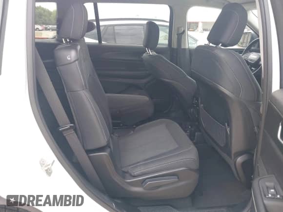 2023 Jeep Grand Cherokee Laredo with VIN 1C4RJKAG2P8814707, listed as a IAAI auction lot 42660356 with 57,634 mi miles and . Bid and sale history available at DreamBid. Image 8.