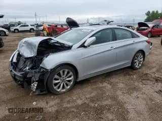 2011 Hyundai Sonata SE with VIN 5NPEC4AC7BH034794, listed as a Copart auction lot 82110205 with 126,415 mi miles and Salvage title. Bid and sale history available at DreamBid. Image 1.