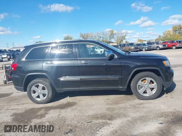 2013 Jeep Grand Cherokee Limited z VIN 1C4RJFBG4DC541915, wystawiony jako IAAI lot #43533562 z przebiegiem 164 436 mil mil oraz . Historia ofert i sprzedaży dostępna na DreamBid. Obrazek 13.