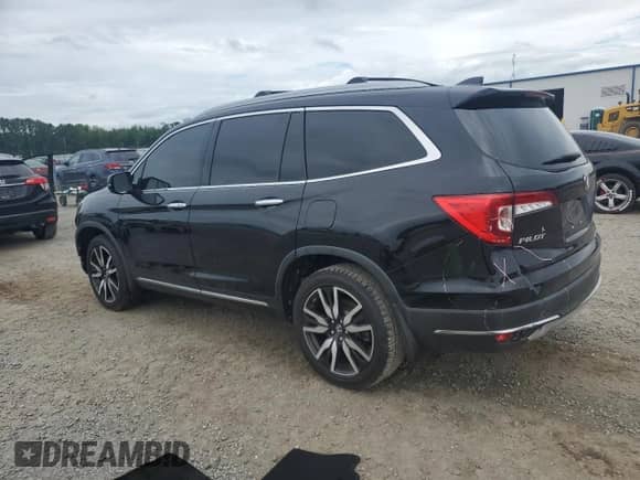 2021 Honda Pilot Elite с VIN 5FNYF6H0XMB023270, выставлен на аукционе Copart как лот 67741735 с пробегом 99 437 миль миль и Списание • Salvage title. История ставок и продаж доступна на DreamBid. Изображение 2.