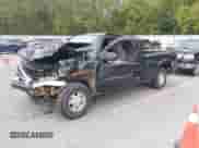 2003 GMC Sierra 1500 SLE z VIN 1GTEK19V53E376057, wystawiony jako IAAI lot #43310919 z przebiegiem Nie podano mil oraz . Historia ofert i sprzedaży dostępna na DreamBid. Obrazek 2.