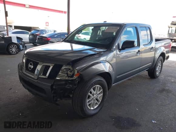 2018 Nissan Frontier SV with VIN 1N6AD0ER6JN735048, listed as a IAAI auction lot 43326700 with 124,053 mi miles and . Bid and sale history available at DreamBid. Image 6.