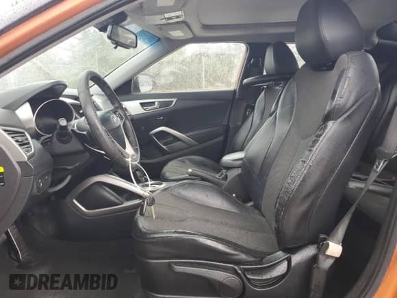 2012 Hyundai Veloster w/Gray Int z VIN KMHTC6AD9CU029014, wystawiony jako Copart lot #86150035 z przebiegiem 112 162 mil mil oraz Szkoda całkowita • Salvage title. Historia ofert i sprzedaży dostępna na DreamBid. Obrazek 7.