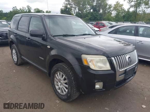 2008 Mercury Mariner Premier with VIN 4M2CU97178KJ44773, listed as a IAAI auction lot 43028644 with 186,934 mi miles and . Bid and sale history available at DreamBid. Image 1.