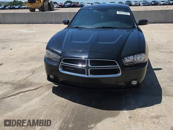 2013 Dodge Charger SXT z VIN 2C3CDXHG1DH502243, wystawiony jako Copart lot #60797055 z przebiegiem 105 632 mil mil oraz Szkoda całkowita • Salvage title. Historia ofert i sprzedaży dostępna na DreamBid. Obrazek 13.