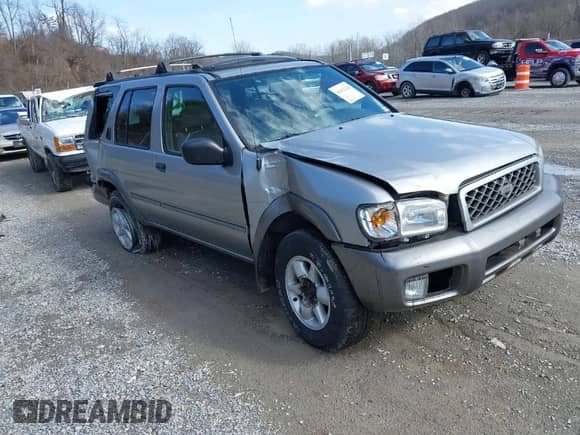 2001 Nissan Pathfinder LE z VIN JN8DR09Y91W600597, wystawiony jako IAAI lot #41612126 z przebiegiem 248 101 mil mil oraz . Historia ofert i sprzedaży dostępna na DreamBid. Obrazek 1.