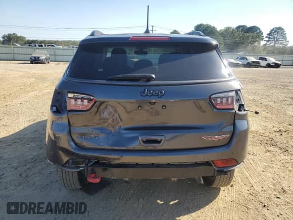 2019 Jeep Compass Trailhawk with VIN 3C4NJDDB2KT713400, listed as a Copart auction lot 84782185 with 63,337 mi miles and Salvage title. Bid and sale history available at DreamBid. Image 6.
