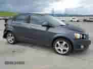 2013 Chevrolet Sonic LTZ с VIN 1G1JE5SH0D4102525, выставлен на аукционе Copart как лот 60976595 с пробегом 138 420 миль миль и Списание • Salvage title. История ставок и продаж доступна на DreamBid. Изображение 4.