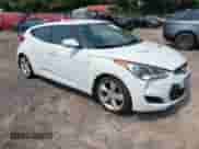 2015 Hyundai Veloster with VIN KMHTC6ADXFU232692, listed as a IAAI auction lot 42407054 with 80,745 mi miles and . Bid and sale history available at DreamBid. Image 1.