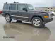 2006 Jeep Commander with VIN 1J8HH48NX6C106832, listed as a Copart auction lot 60544515 with 170,404 mi miles and Clean title. Bid and sale history available at DreamBid. Image 4.