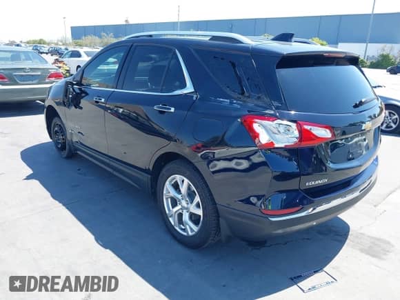 2020 Chevrolet Equinox Premier z VIN 2GNAXXEV2L6196670, wystawiony jako IAAI lot #42640318 z przebiegiem 52 343 mil mil oraz . Historia ofert i sprzedaży dostępna na DreamBid. Obrazek 3.