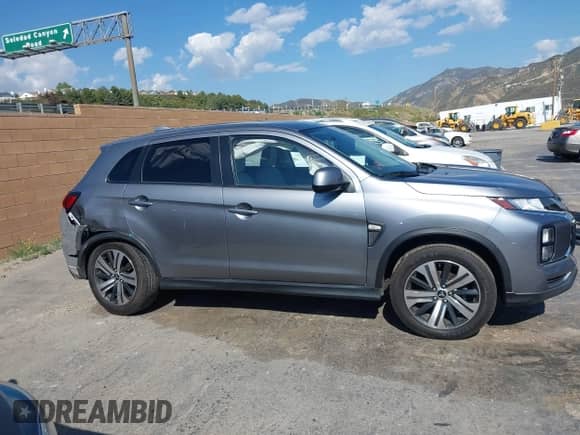 2021 Mitsubishi Outlander ES z VIN JA4APUAU3MU002584, wystawiony jako IAAI lot #42153601 z przebiegiem 56 000 mil mil oraz . Historia ofert i sprzedaży dostępna na DreamBid. Obrazek 13.