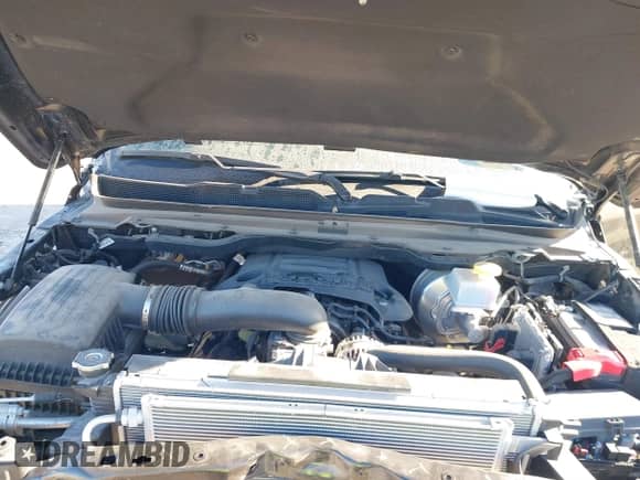 2022 Ram 1500 Big Horn z VIN 1C6RREBT3NN442466, wystawiony jako IAAI lot #40734114 z przebiegiem 22 586 mil mil oraz . Historia ofert i sprzedaży dostępna na DreamBid. Obrazek 10.