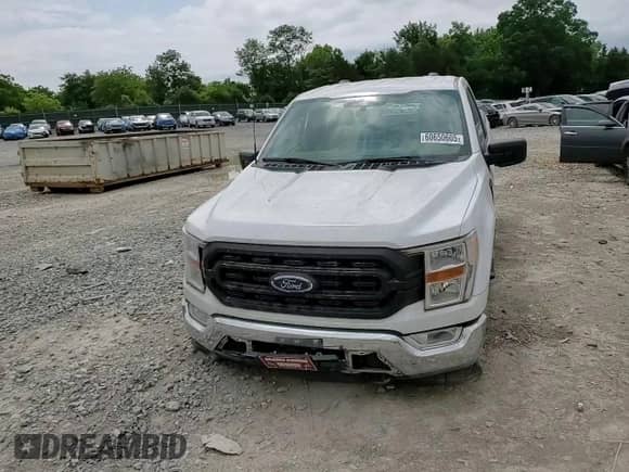 2021 Ford F-150 XL z VIN 1FTMF1EP7MKE72931, wystawiony jako Copart lot #60650605 z przebiegiem 23 825 mil mil oraz Szkoda całkowita • Salvage title. Historia ofert i sprzedaży dostępna na DreamBid. Obrazek 13.