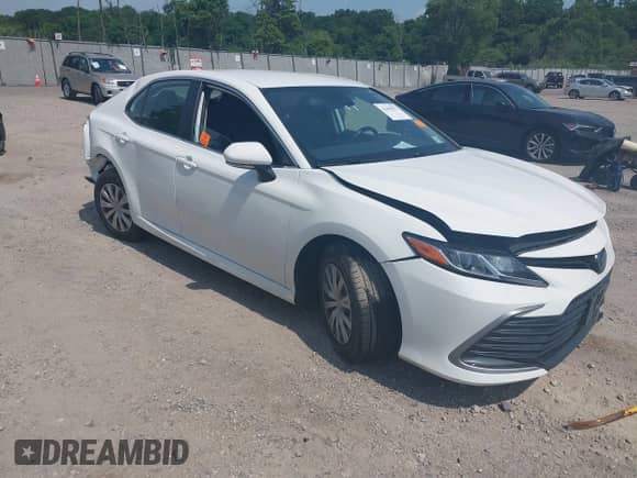 2022 Toyota Camry Hybrid LE with VIN 4T1C31AK2NU591549, listed as a IAAI auction lot 42499072 with 55,882 mi miles and . Bid and sale history available at DreamBid. Image 1.