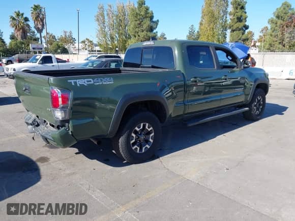 2021 Toyota Tacoma SR5 z VIN 3TMDZ5BN8MM114649, wystawiony jako IAAI lot #43493615 z przebiegiem 63 288 mil mil oraz . Historia ofert i sprzedaży dostępna na DreamBid. Obrazek 4.