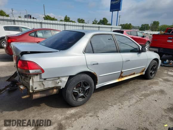 2002 Honda Accord EX with VIN 1HGCG55622A014483, listed as a Copart auction lot 81110335 with 305,384 mi miles and Salvage title. Bid and sale history available at DreamBid. Image 3.