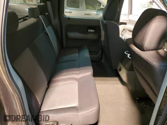 2007 Ford F-150 XLT с VIN 1FTRW02W07KA94452, выставлен на аукционе Copart как лот 47552485 с пробегом 335 643 миль миль и Списание • Salvage title. История ставок и продаж доступна на DreamBid. Изображение 11.