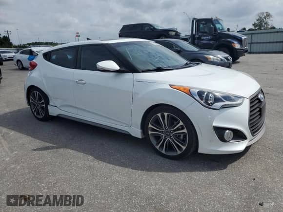 2016 Hyundai Veloster Turbo с VIN KMHTC6AE7GU292343, выставлен на аукционе Copart как лот 81943395 с пробегом 71 718 миль миль и Списание • Salvage title. История ставок и продаж доступна на DreamBid. Изображение 4.