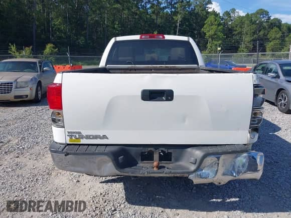 2012 Toyota Tundra z VIN 5TFRU5F15CX026386, wystawiony jako IAAI lot #42588467 z przebiegiem 256 381 mil mil oraz . Historia ofert i sprzedaży dostępna na DreamBid. Obrazek 16.