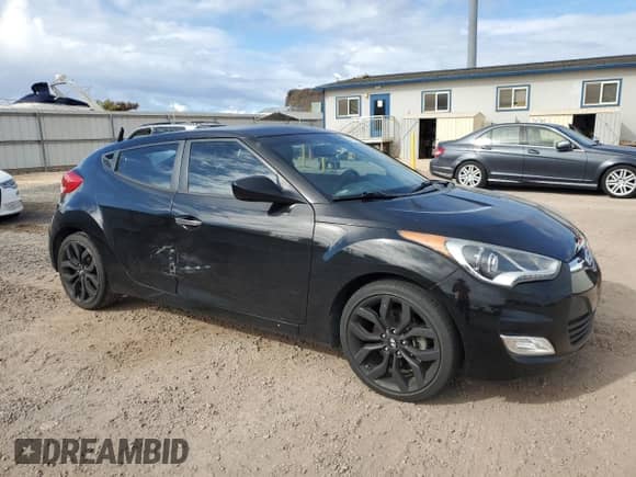2015 Hyundai Veloster z VIN KMHTC6AD2FU220312, wystawiony jako Copart lot #65853685 z przebiegiem 46 683 mil mil oraz Szkoda całkowita • Salvage title. Historia ofert i sprzedaży dostępna na DreamBid. Obrazek 4.