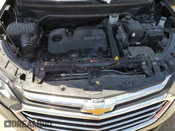 2020 Chevrolet Equinox Premier с VIN 2GNAXNEVXL6157846, выставлен на аукционе Copart как лот 61673815 с пробегом 129 169 миль миль и Списание • Salvage title. История ставок и продаж доступна на DreamBid. Изображение 12.