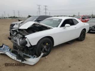2012 Dodge Challenger SXT Plus with VIN 2C3CDYAG1CH128246, listed as a Copart auction lot 60747625 with 104,196 mi miles and Salvage title. Bid and sale history available at DreamBid. Image 1.