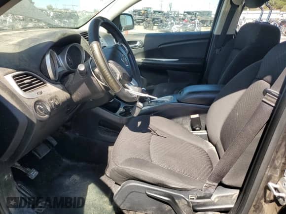 2014 Dodge Journey American Value with VIN 3C4PDCAB8ET301257, listed as a Copart auction lot 67421645 with 96,794 mi miles and Salvage title. Bid and sale history available at DreamBid. Image 7.