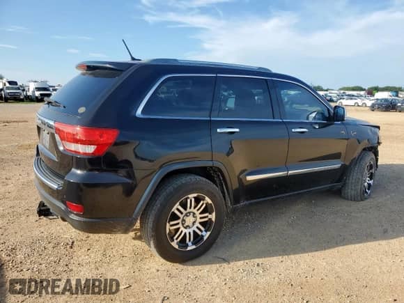 2012 Jeep Grand Cherokee Limited z VIN 1C4RJEBG5CC275197, wystawiony jako Copart lot #63839845 z przebiegiem 158 232 mil mil oraz Szkoda całkowita • Salvage title. Historia ofert i sprzedaży dostępna na DreamBid. Obrazek 3.