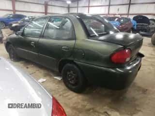 1999 Chevrolet Metro Lsi z VIN 2C1MR5226X6716192, wystawiony jako Copart lot #43066035 z przebiegiem 201 244 mil mil oraz Szkoda całkowita • Salvage title. Historia ofert i sprzedaży dostępna na DreamBid. Obrazek 2.