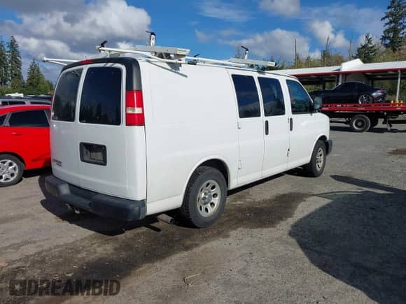 2013 Chevrolet Express Cargo with VIN 1GCSHAF41D1122514, listed as a IAAI auction lot 43495433 with 291,622 mi miles and . Bid and sale history available at DreamBid. Image 4.